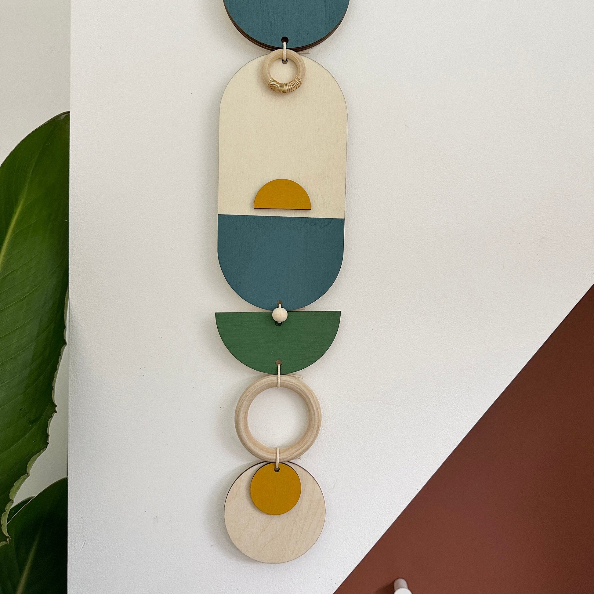 Modern Geometric Wall Hanging with Gold Metal Details