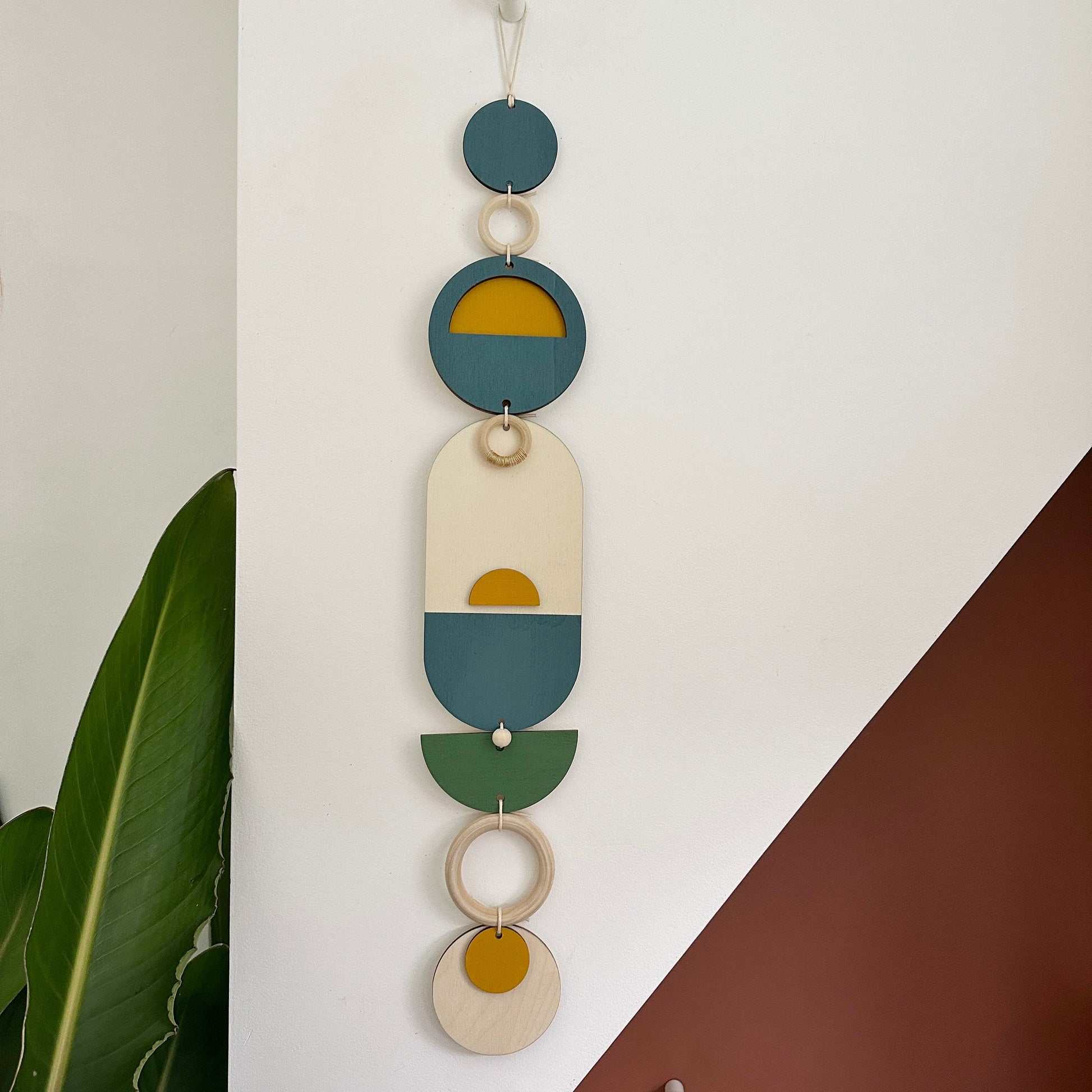 Modern Geometric Wall Hanging with Gold Metal Details