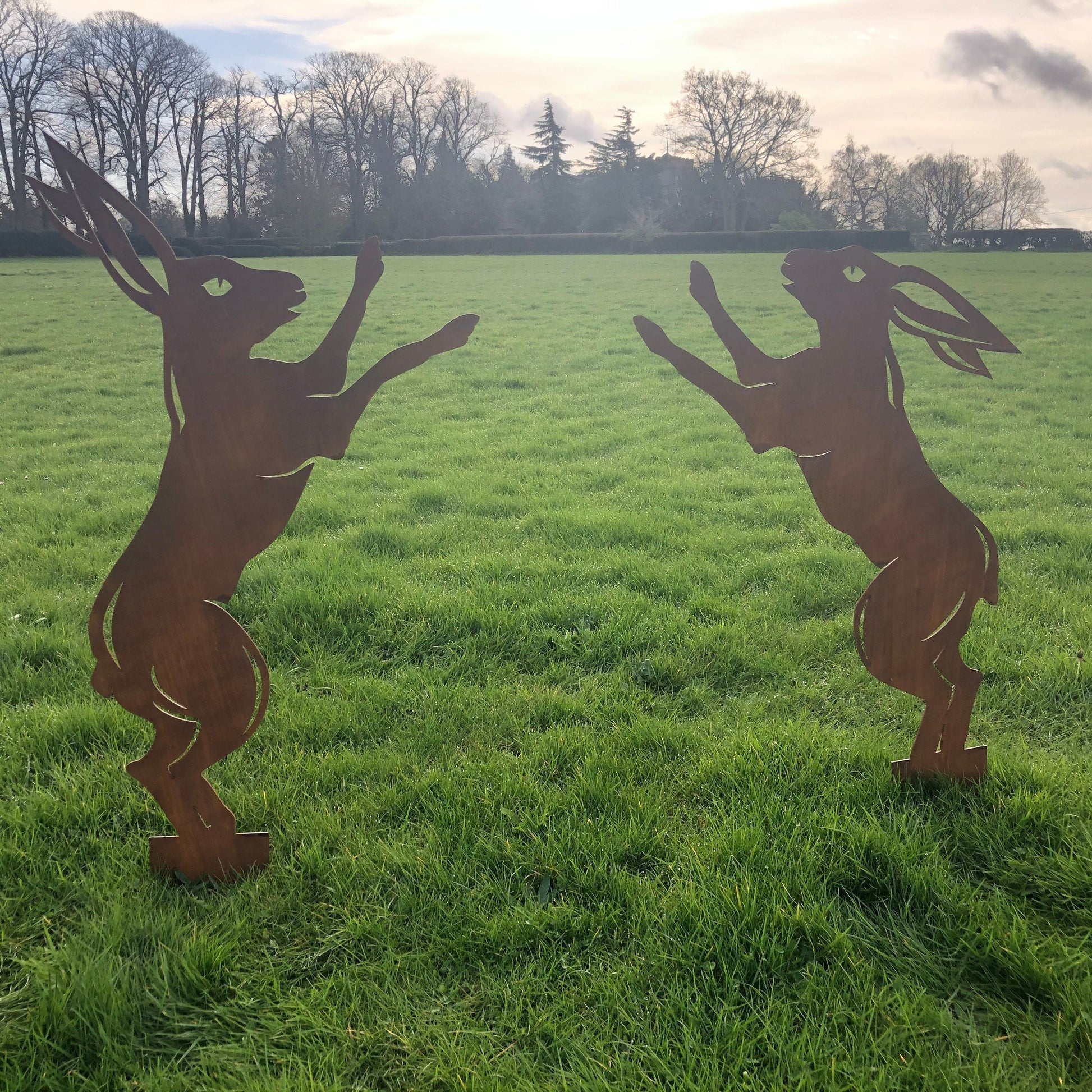 Pair of Rusty Metal Boxing Hares Garden Statue