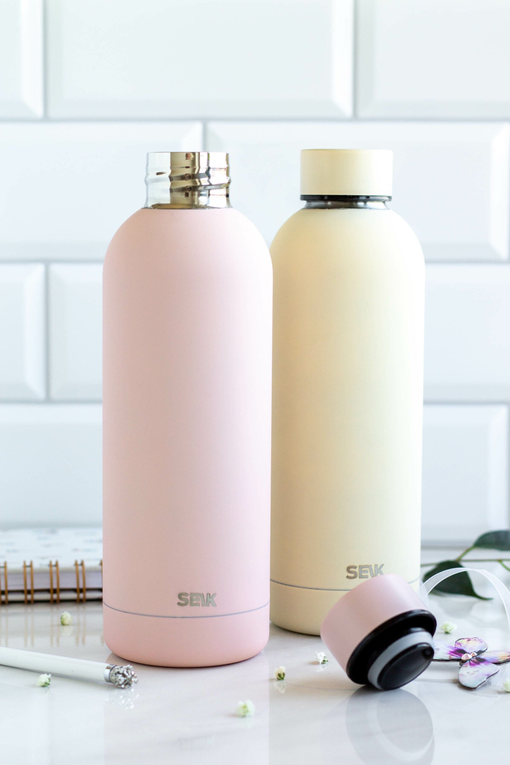 bold yellow seik thermos bottle on a dark background, showcasing its vibrant color and sleek design