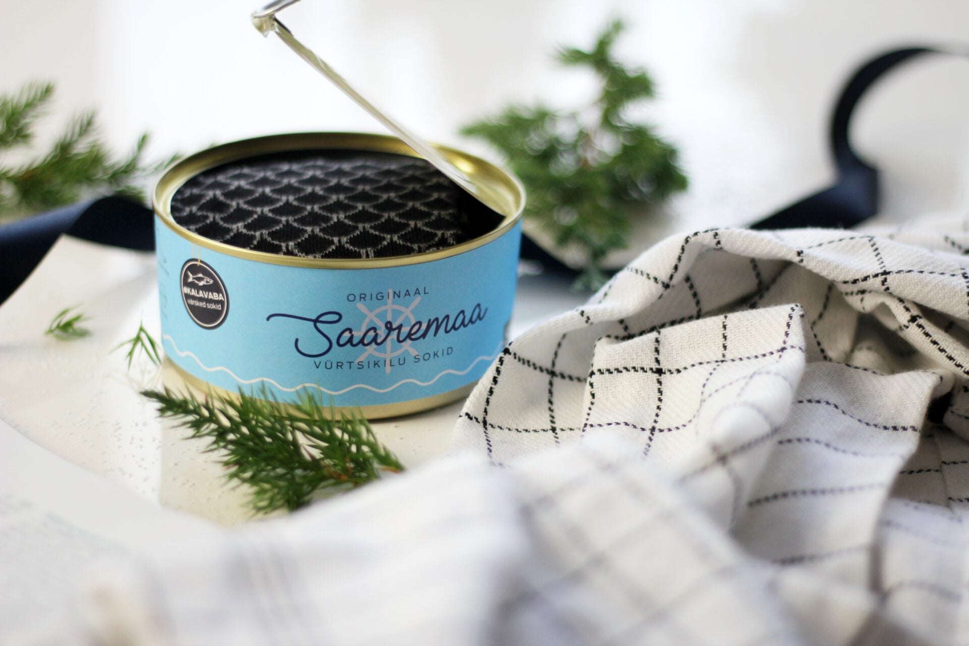 saaremaa spiced herring socks in a warm golden light, highlighting their soft cotton texture and comfortable fit