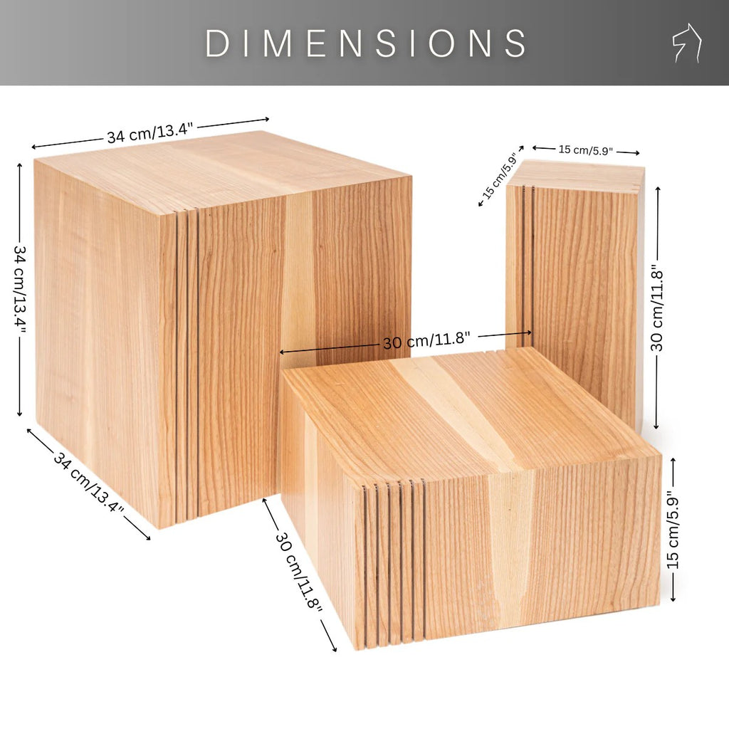 a set of three warm wooden plant stands nestled together in a cozy, sunlit corner