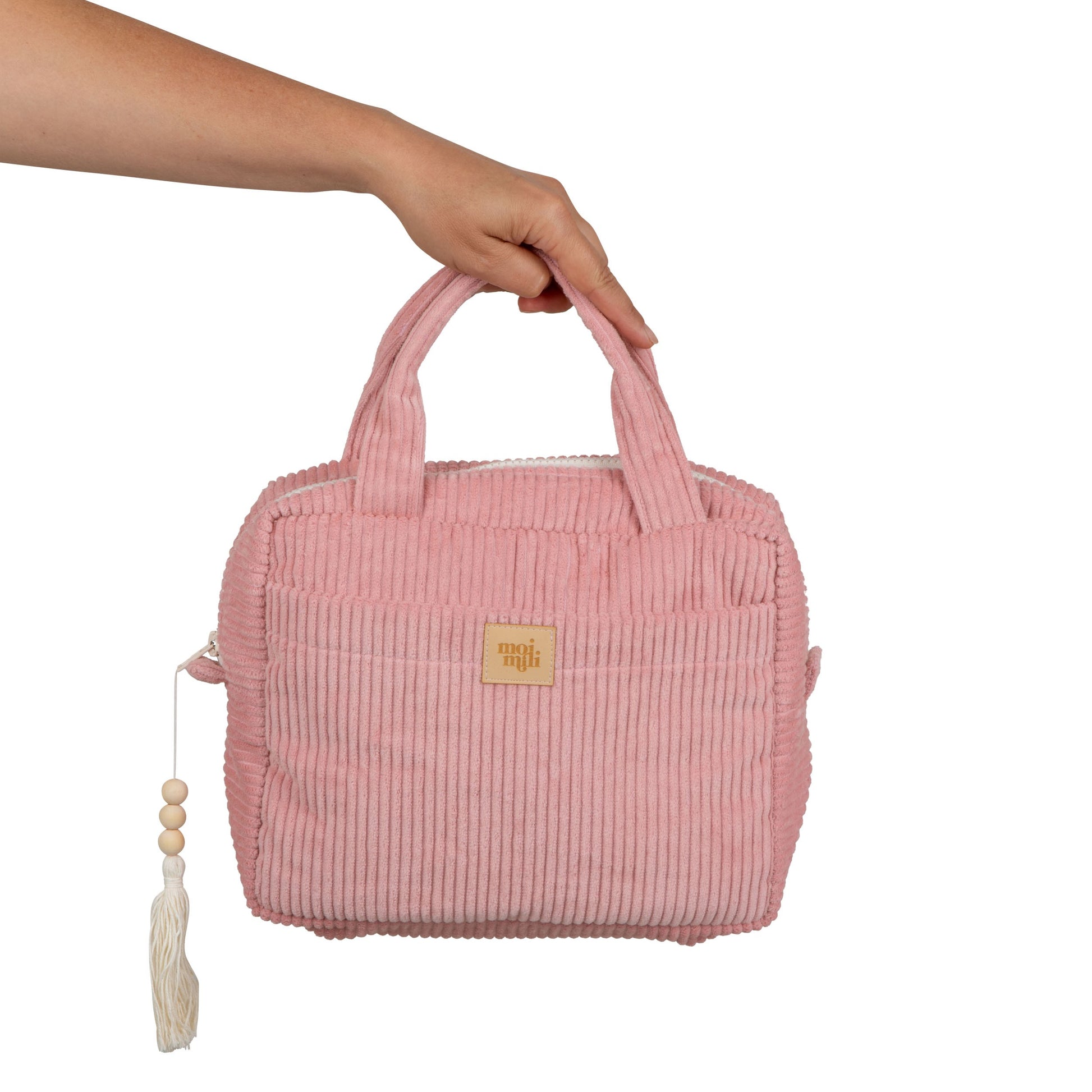 bold chic baby pink cotton makeup bag set open on marble showing stylish interior pockets