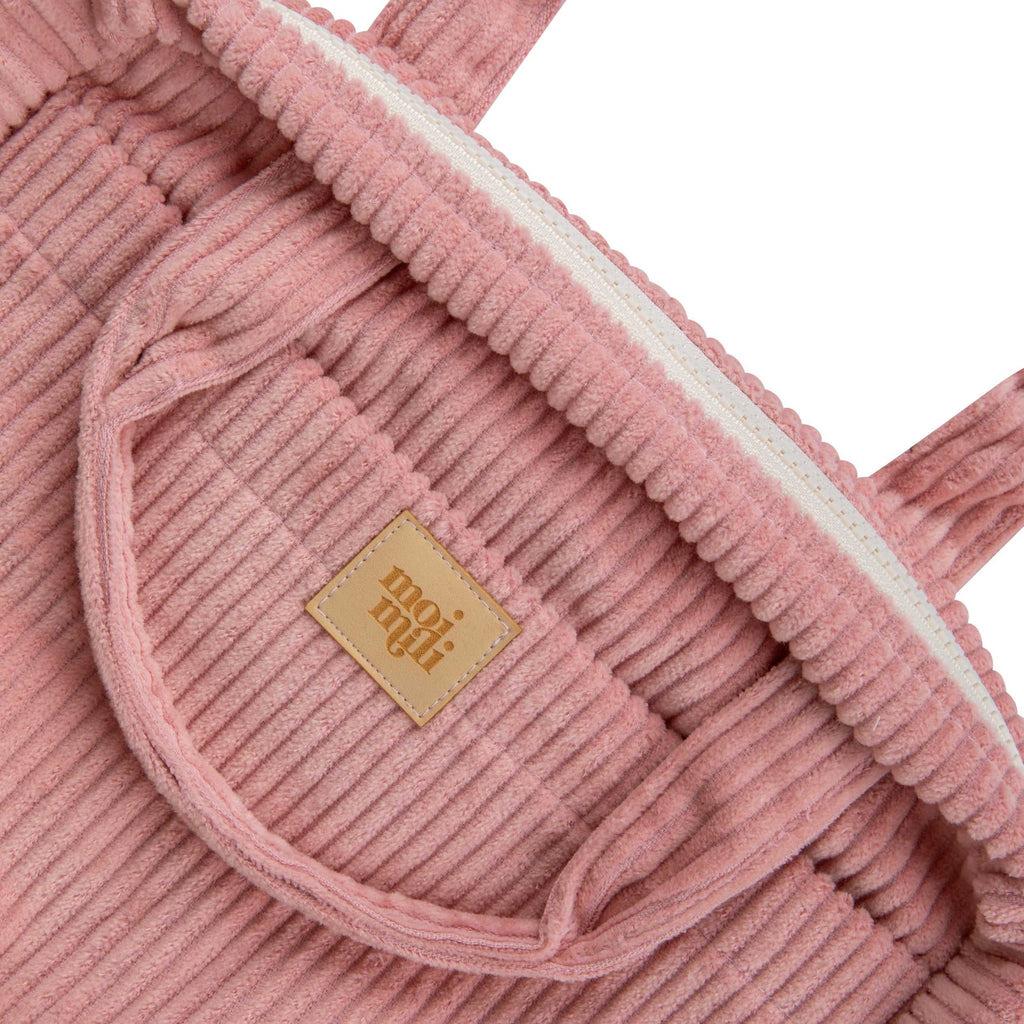 handmade baby pink cotton makeup bag set open on a table showing its inner and outer pockets