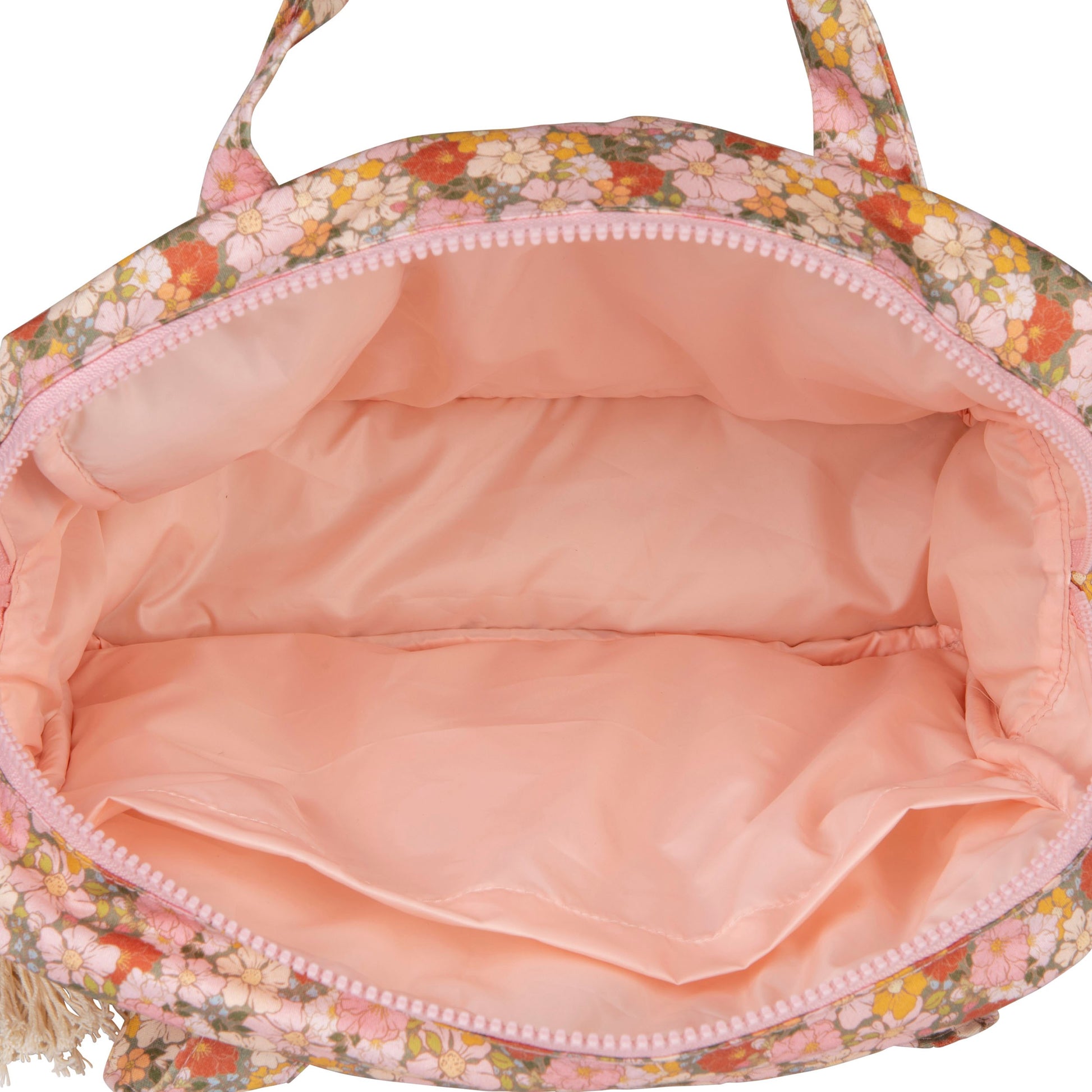 handmade green garden makeup bag set laid on a rustic wooden table, showcasing its elegant cotton texture and practical pockets