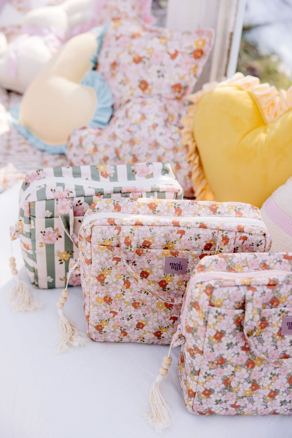 practical spring garden makeup bag set open to show interior pockets and waterproof lining