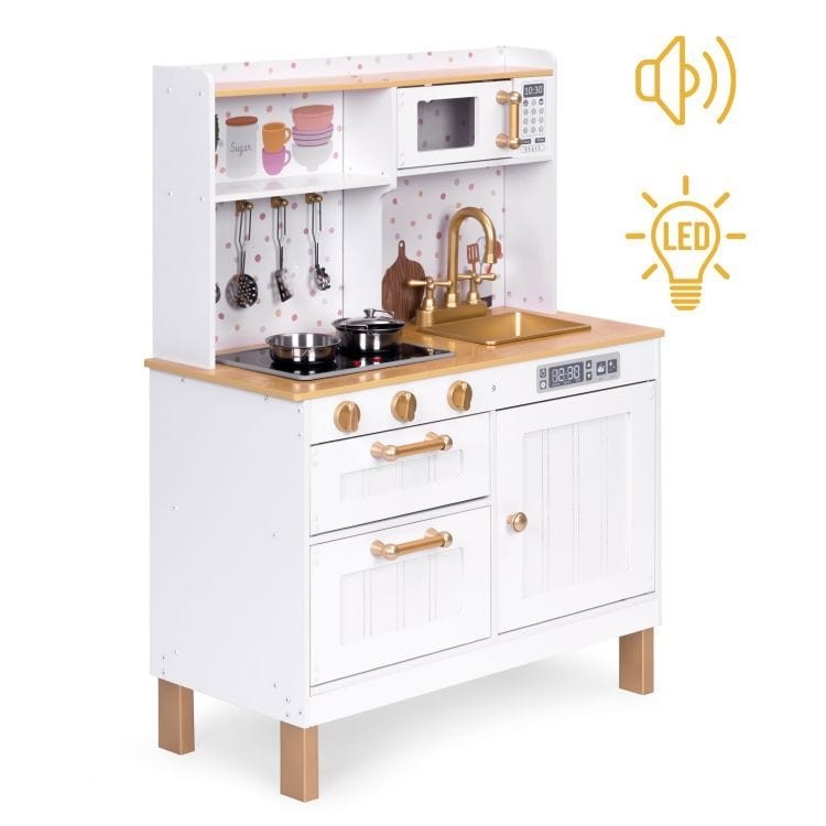 a child's hands opening the oven door on a wooden play kitchen