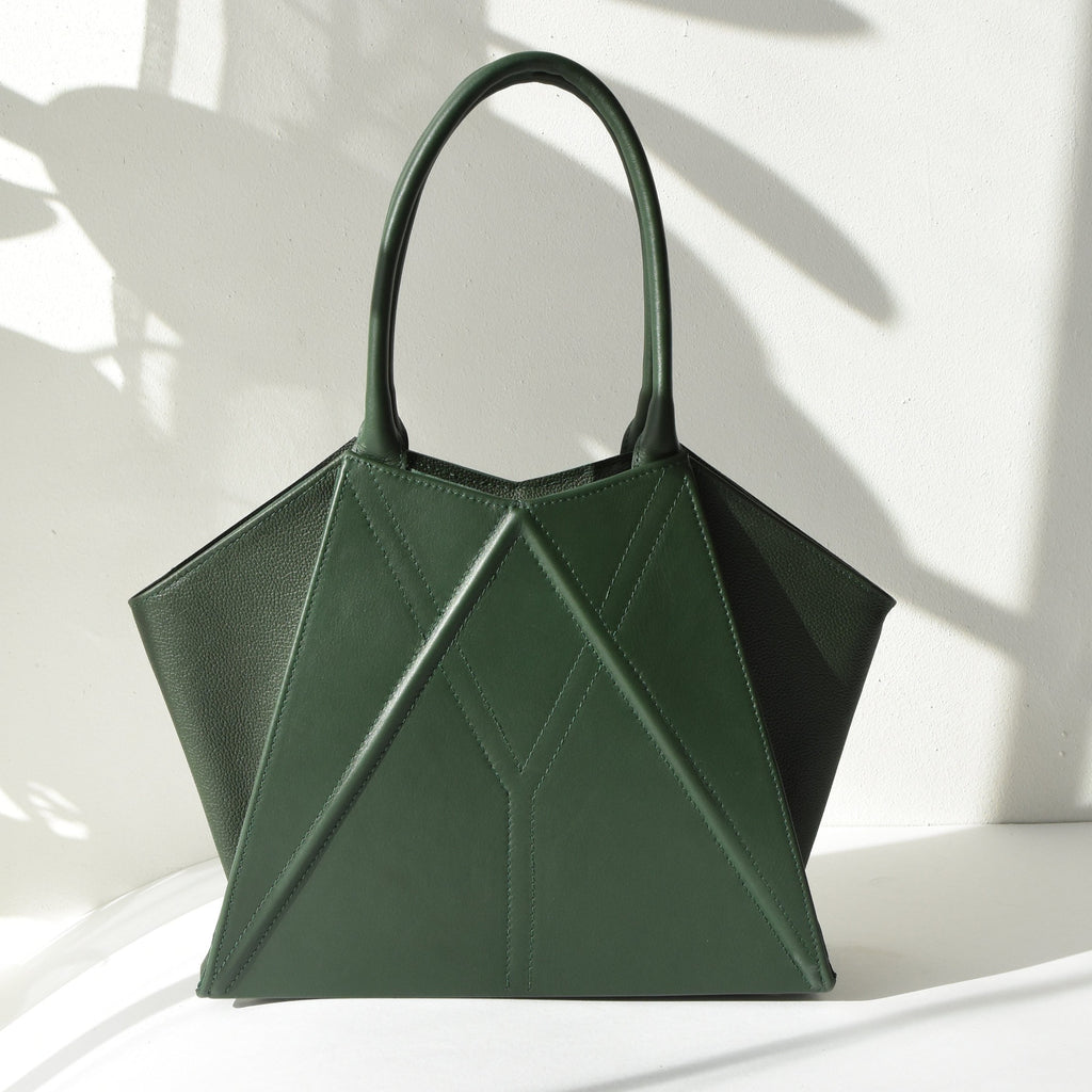 elegant gerda retter handmade leather tote bag with magnetic closure in a refined setting