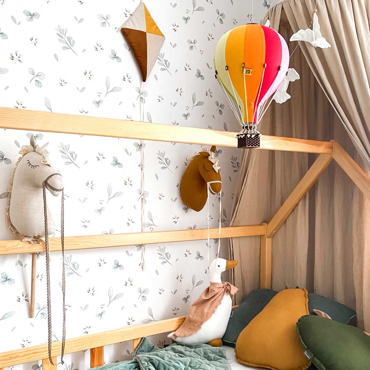 playful leaves minimini wallpaper with storks and lakes in a sunlit kids room