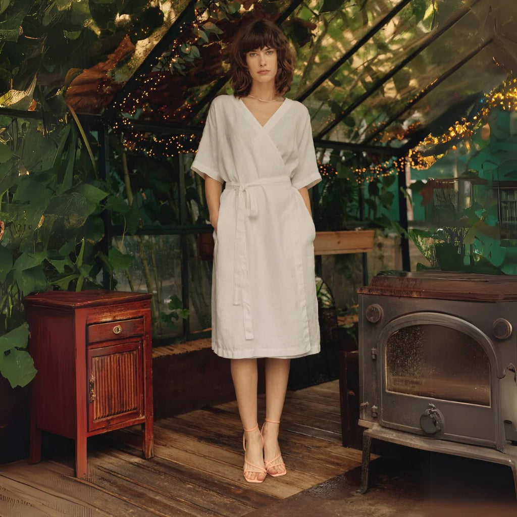 Introduce Elegance and Comfort with the Versatile Vine Linen Wrap Dress by Linen Tales at www.brixbailey.com