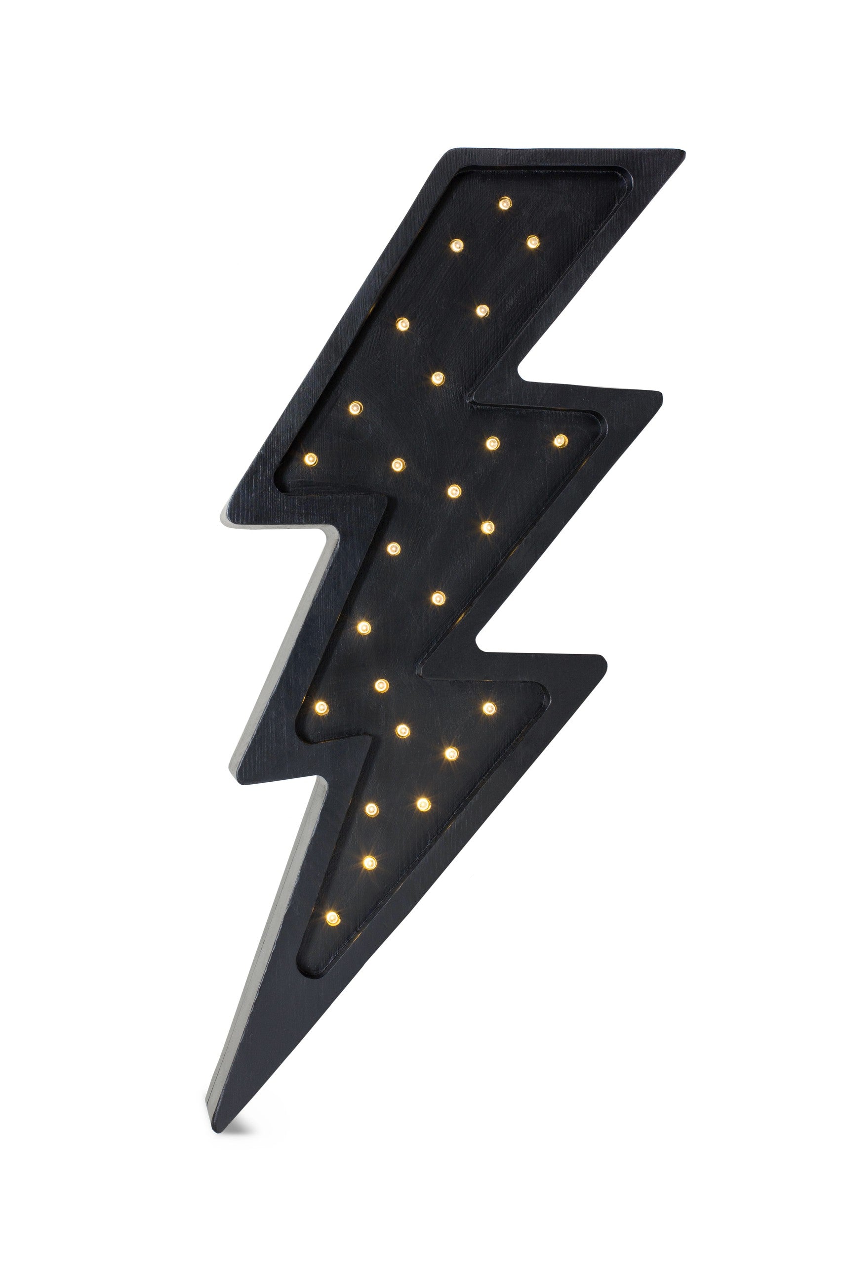playful bolt lamp casting a warm glow on a child's bedside table with a favorite toy