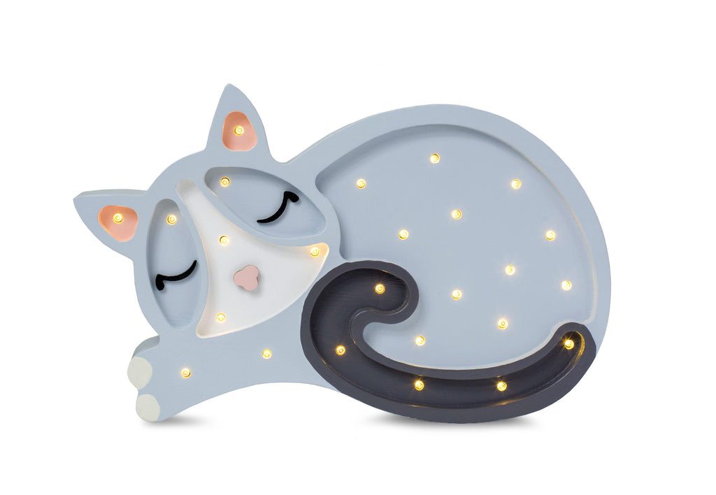 handcrafted pine wood cat lamp casting a soft warm glow on a nursery shelf