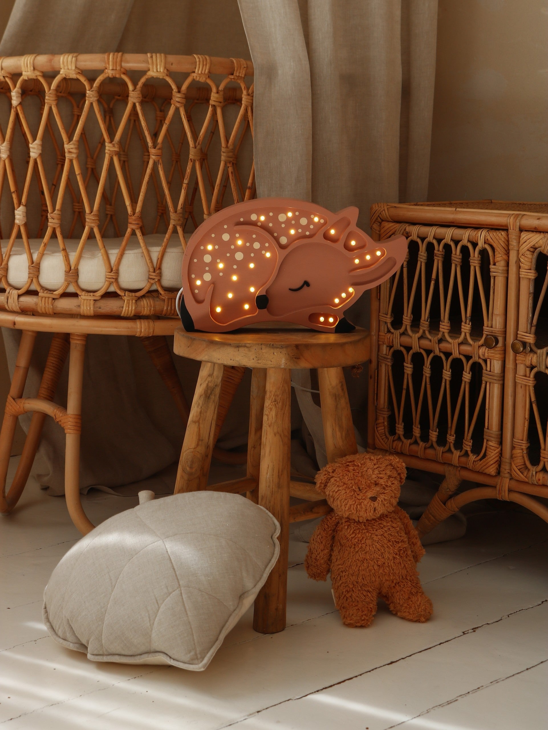 elegant solid pinewood deer lamp casting a warm, refined glow in a nursery