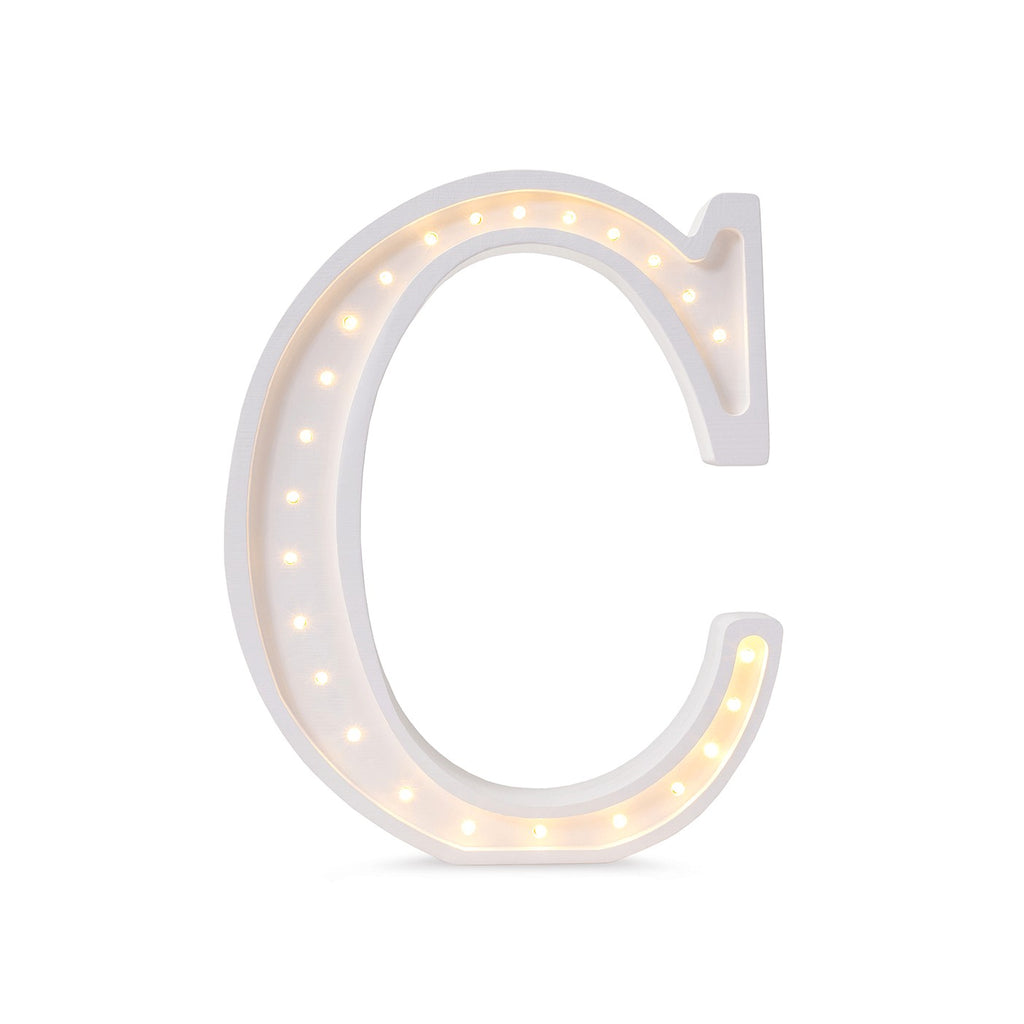 softly glowing letter c lamp casting a warm, comforting glow on a child's nightstand