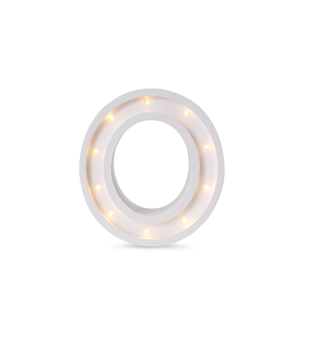bold little lights letter o lamp glowing warmly in a modern childs room
