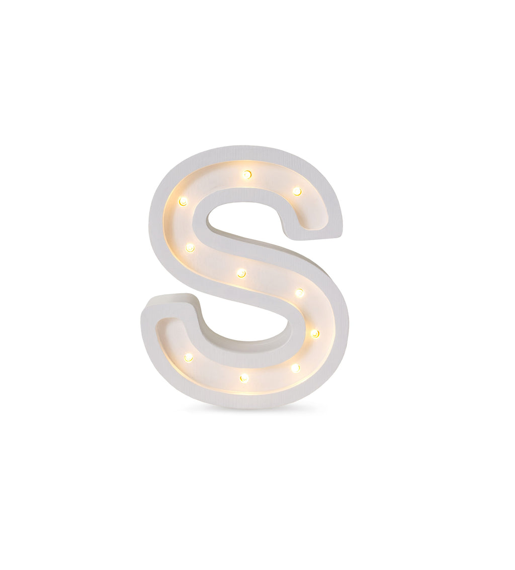 bold solid pinewood letter lamp s casting a warm glow in a modern nursery