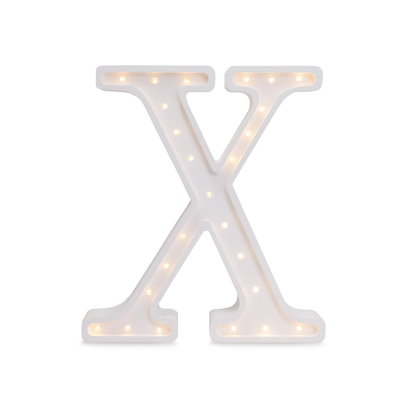 bold close-up of a handmade pinewood letter lamp glowing with warm light in a dark room
