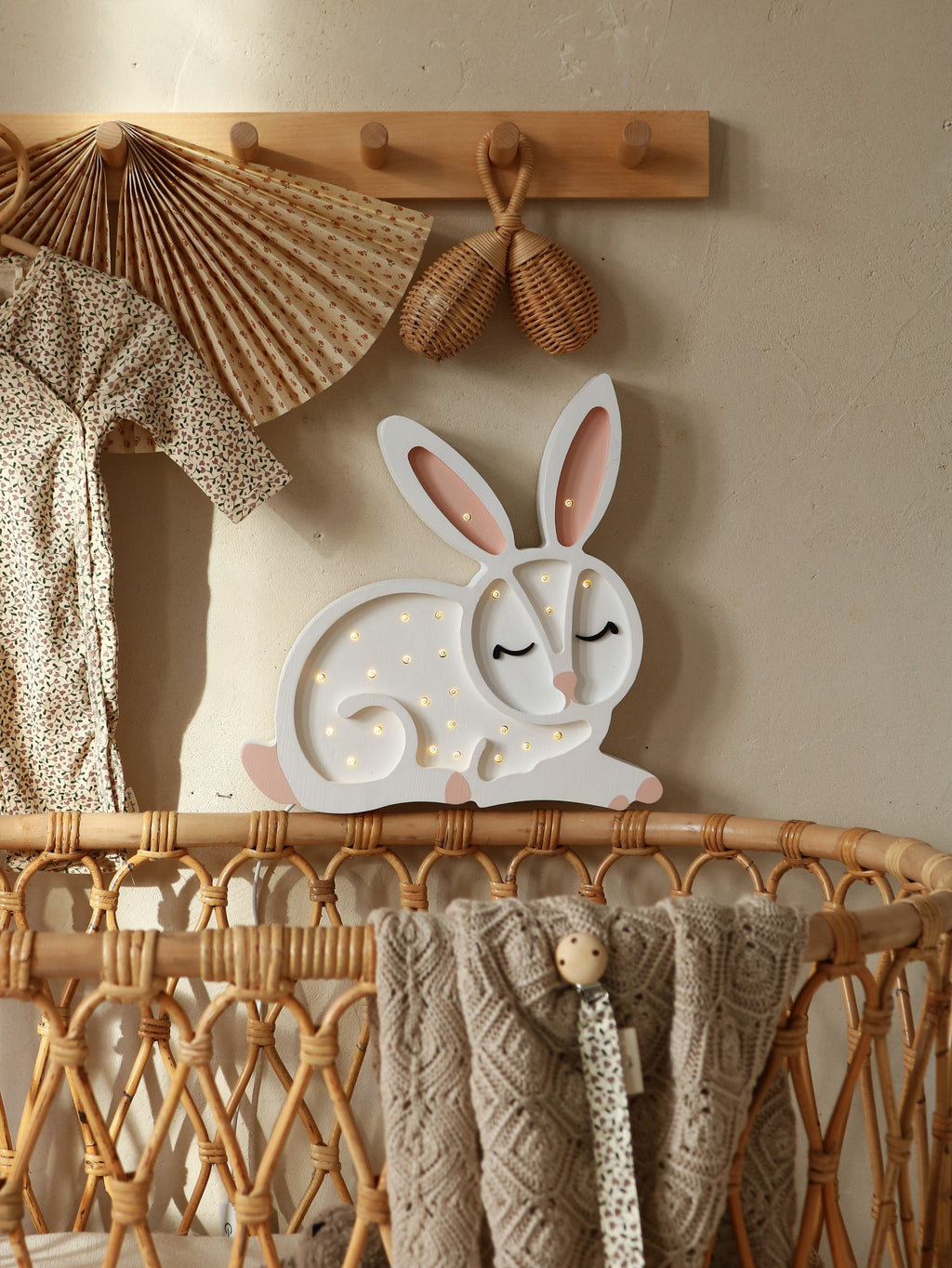 softly glowing bunny lamp casting a warm, comforting glow in a cozy nursery