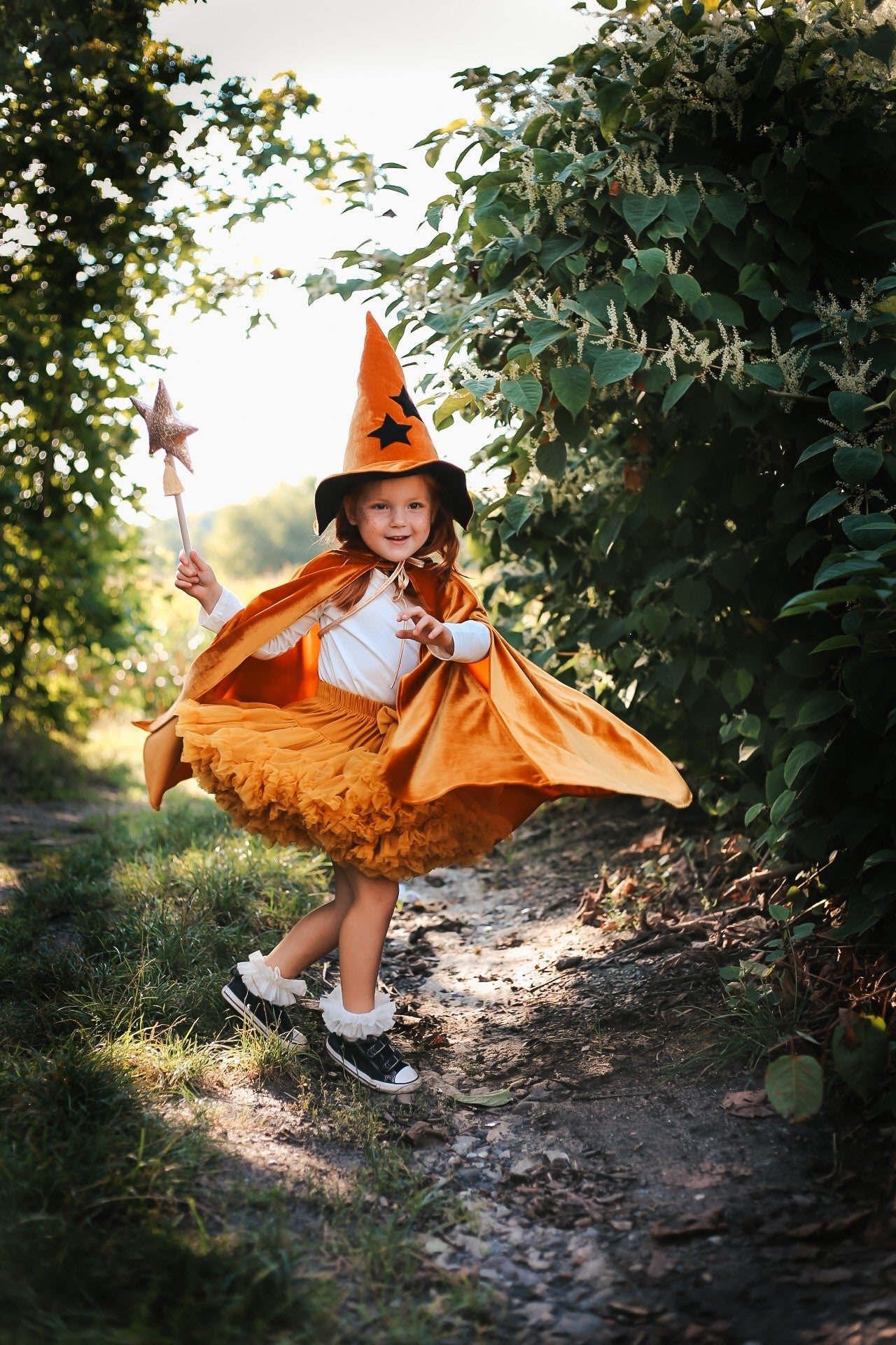 handmade golden velour hooded cape for kids in soft morning light