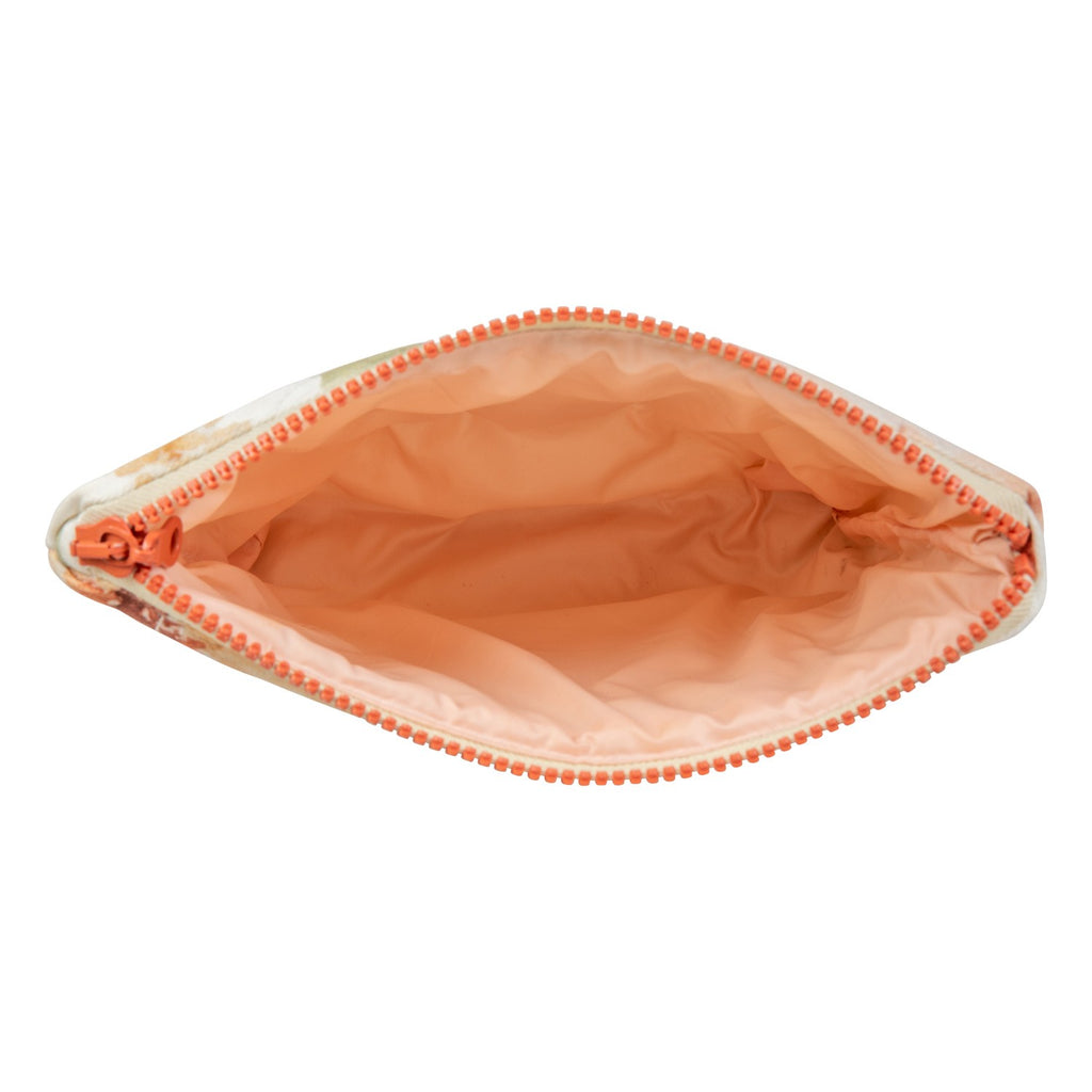 a functional flower power makeup bag set open on a vanity showing its practical waterproof lining and pockets