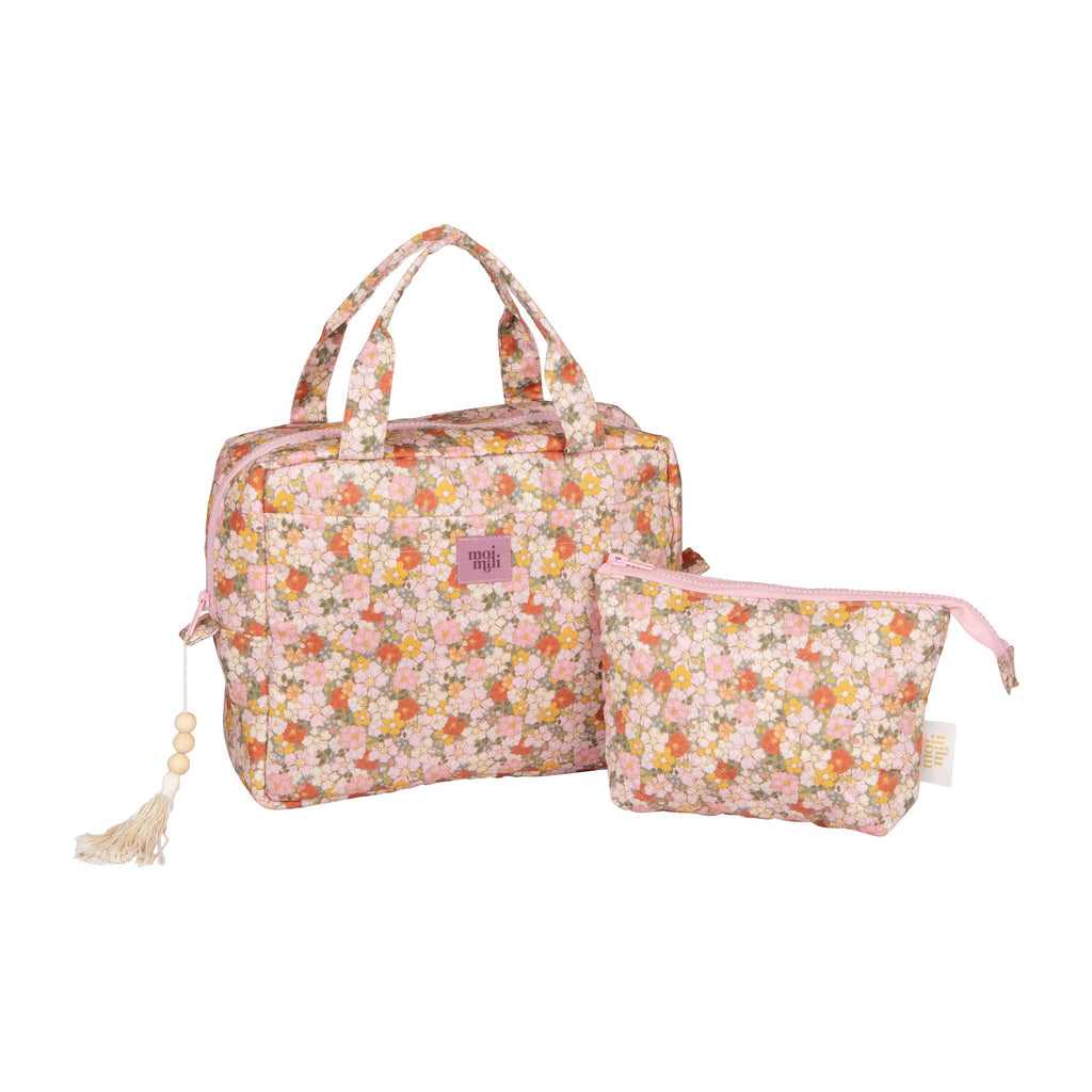 handmade green garden makeup bag set of two on a rustic wooden table