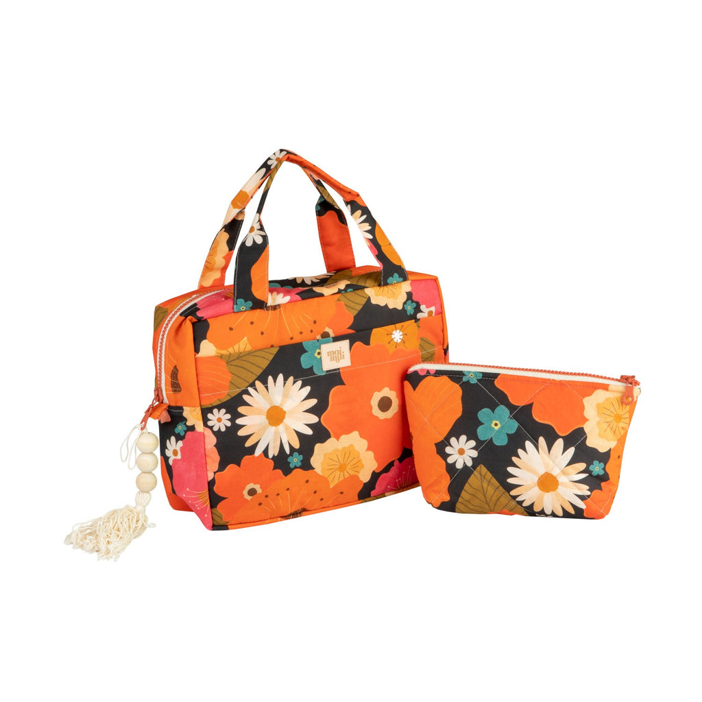 handmade polish floral makeup bag set of two laid on a rustic wooden table
