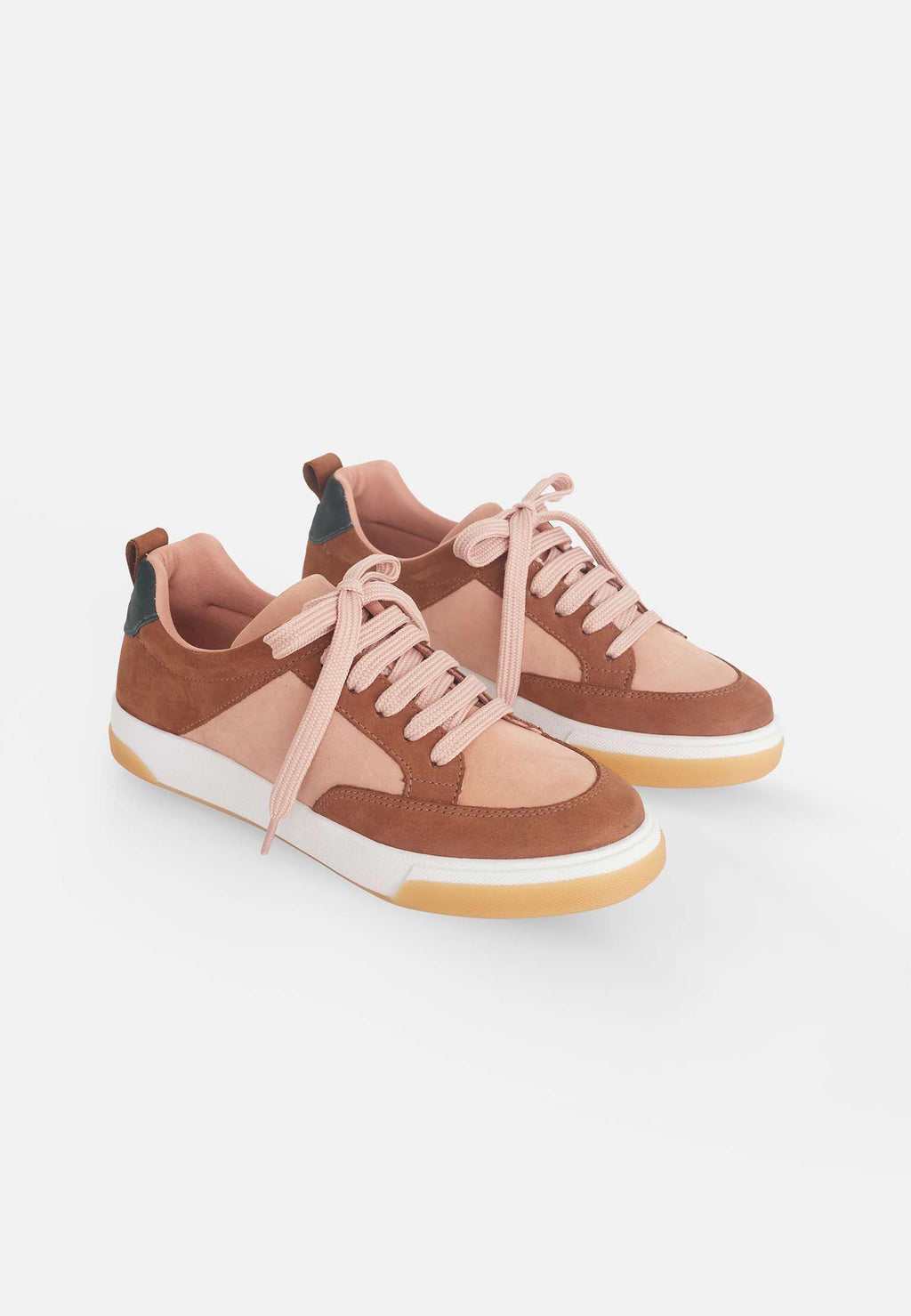 soft beige leather womens sneakers with a warm brown and orange colorblock detail