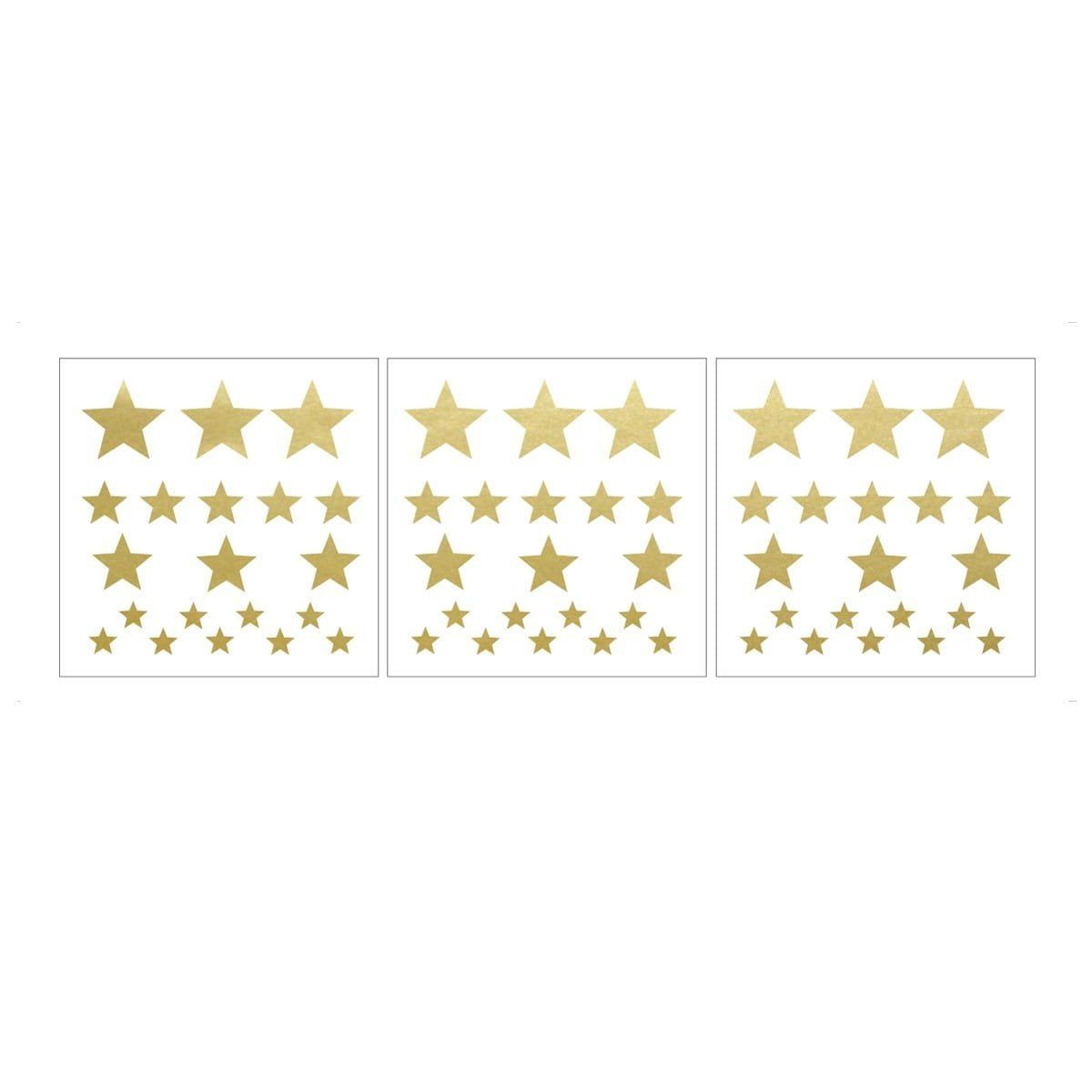 close-up of a gold star sticker being easily repositioned on a kids room wall