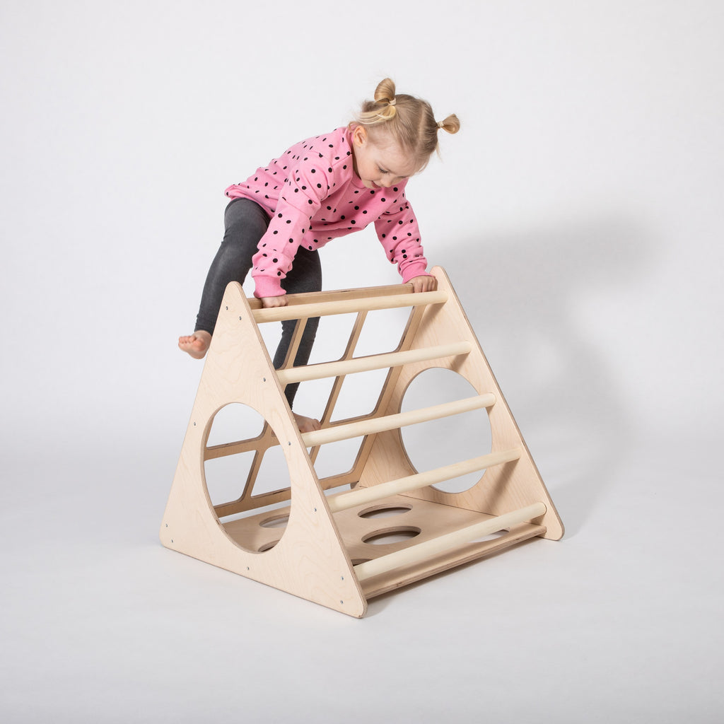 a functional montessori 3-angle climber shown with assembly tools and instructions for easy setup