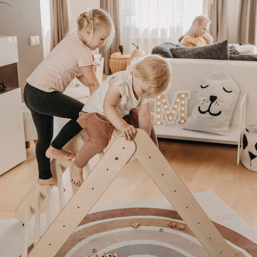 montessori climbing triangle folded flat for compact storage and easy assembly