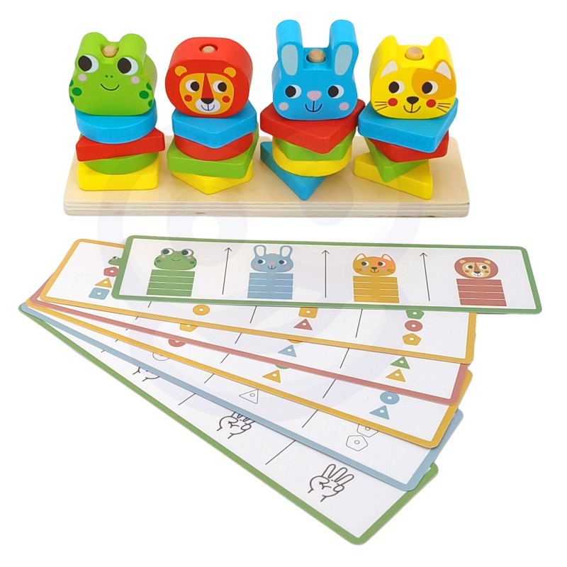 a child's hand placing a wooden lion block onto the montessori pyramid puzzle