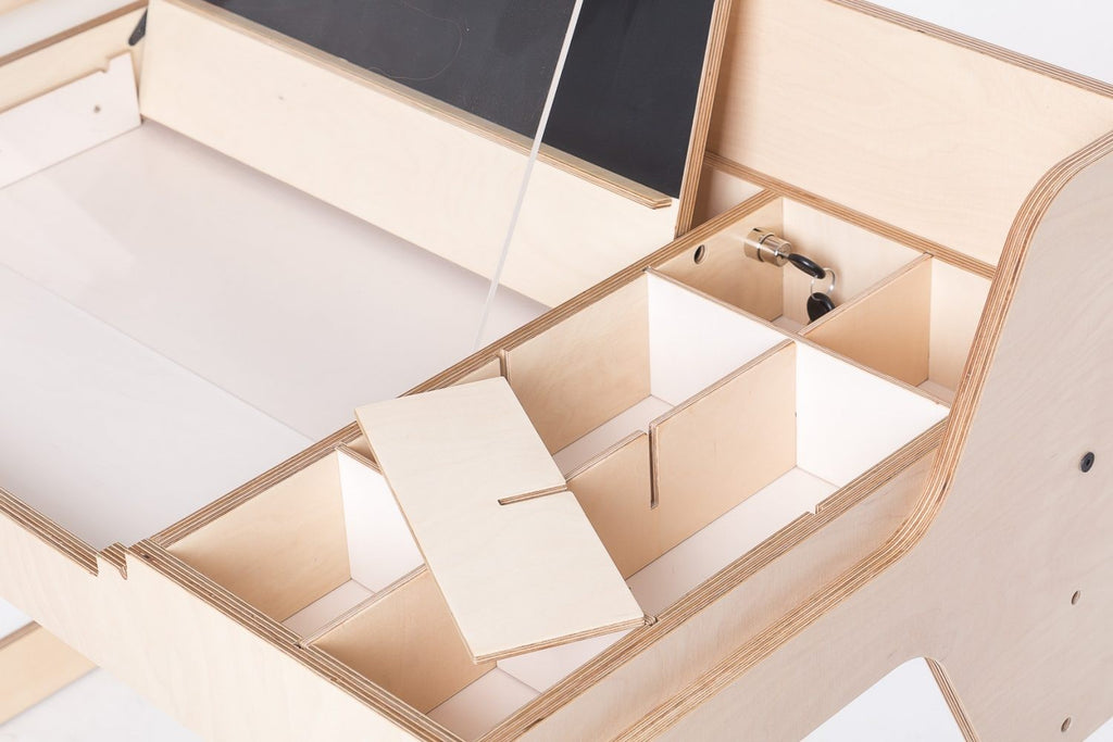 luula kids art table with sand tray and water bowl in warm morning light