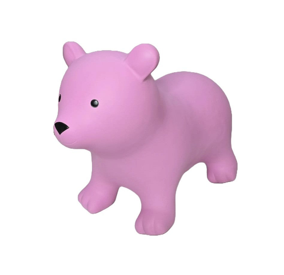 a soft pink bear hopper toy sitting gently on a cozy nursery rug