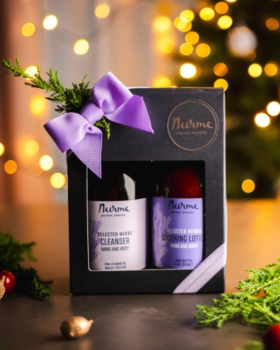 playful close-up of lavender gift set with shimmering ribbon on a sunlit windowsill