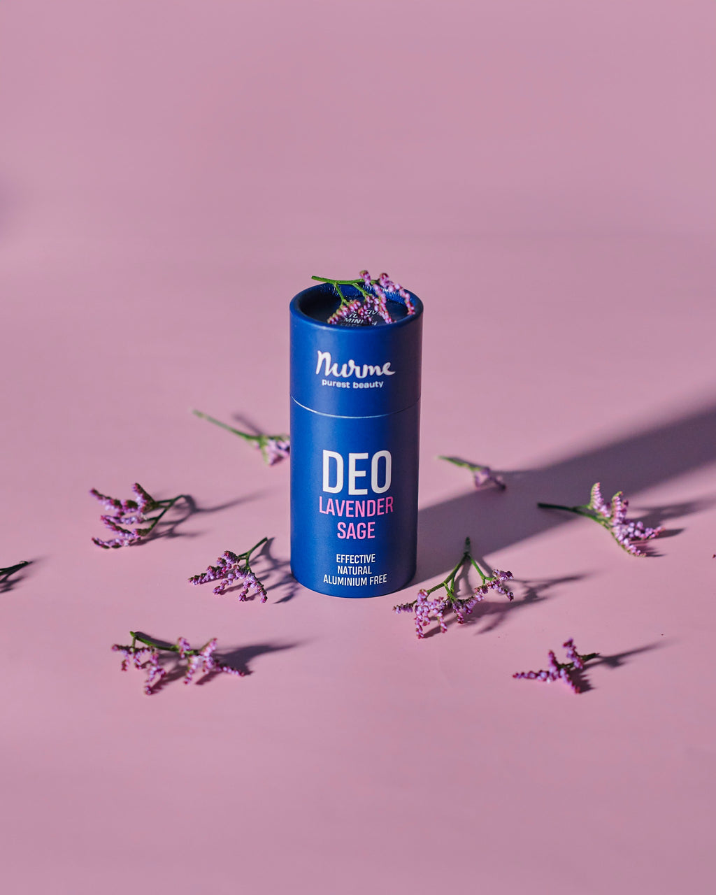 elegant natural lavender sage deodorant in soft morning light on a minimalist marble surface