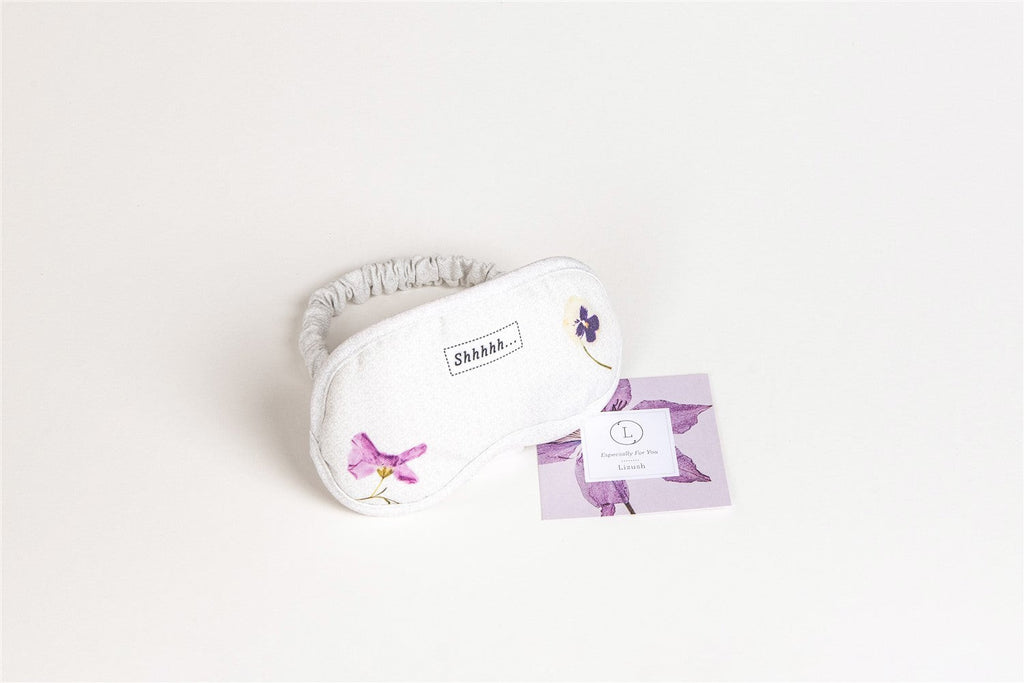 a functional and practical arrangement of the new mom skincare gift set on a rustic wooden surface