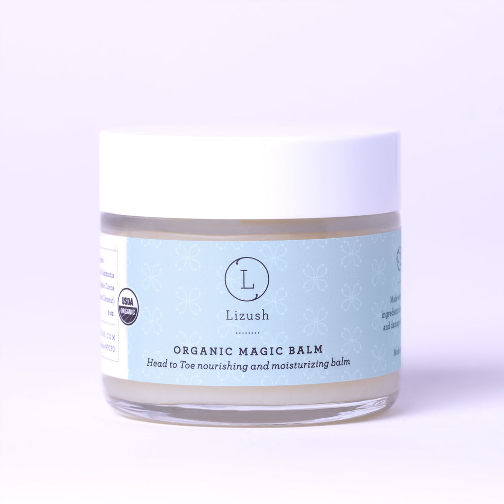 close-up of organic nipple balm jar on a natural wood surface, practical for daily breastfeeding care