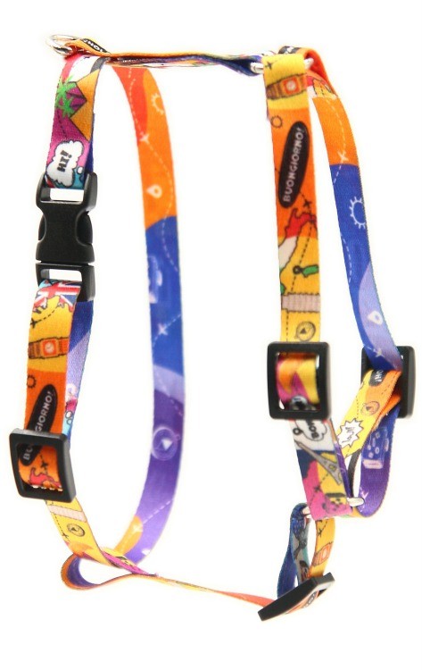elegant pet travel harness with a sleek nickel-plated handle against a minimalist backdrop