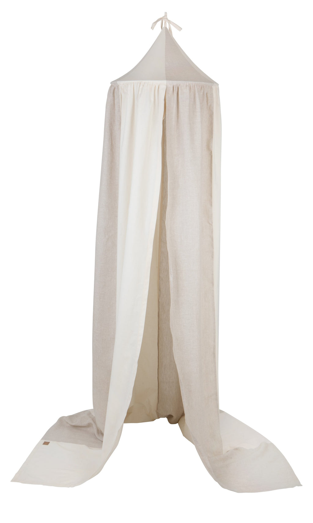 elegant cream circus canopy with soft linen drapes, hanging gracefully over a cozy reading nook