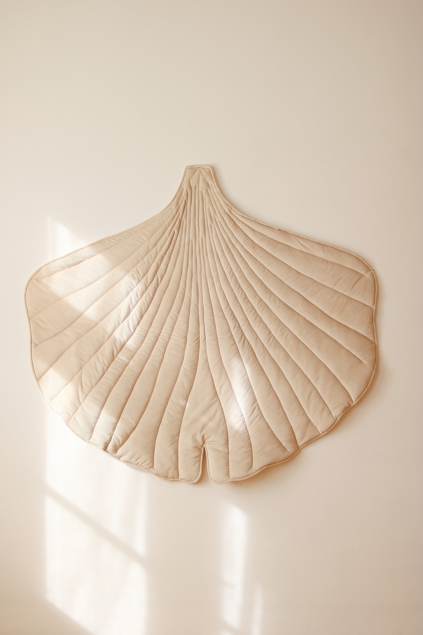 playful cream ginkgo leaf playmat with soft velvet texture, perfect for kids' adventures and cozy naps