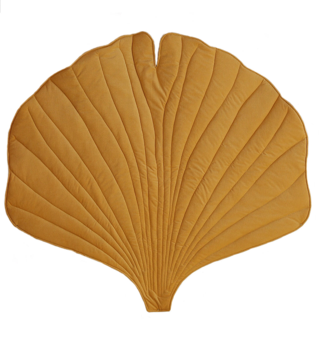 sunlit yellow ginkgo leaf playmat on grass, soft velvet side up, perfect for picnics or toddler play