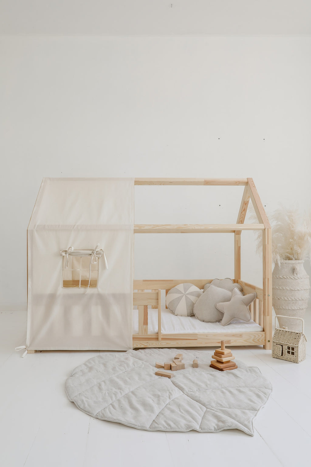 handmade sand ginkgo leaf playmat in a cozy nursery setting with soft morning light