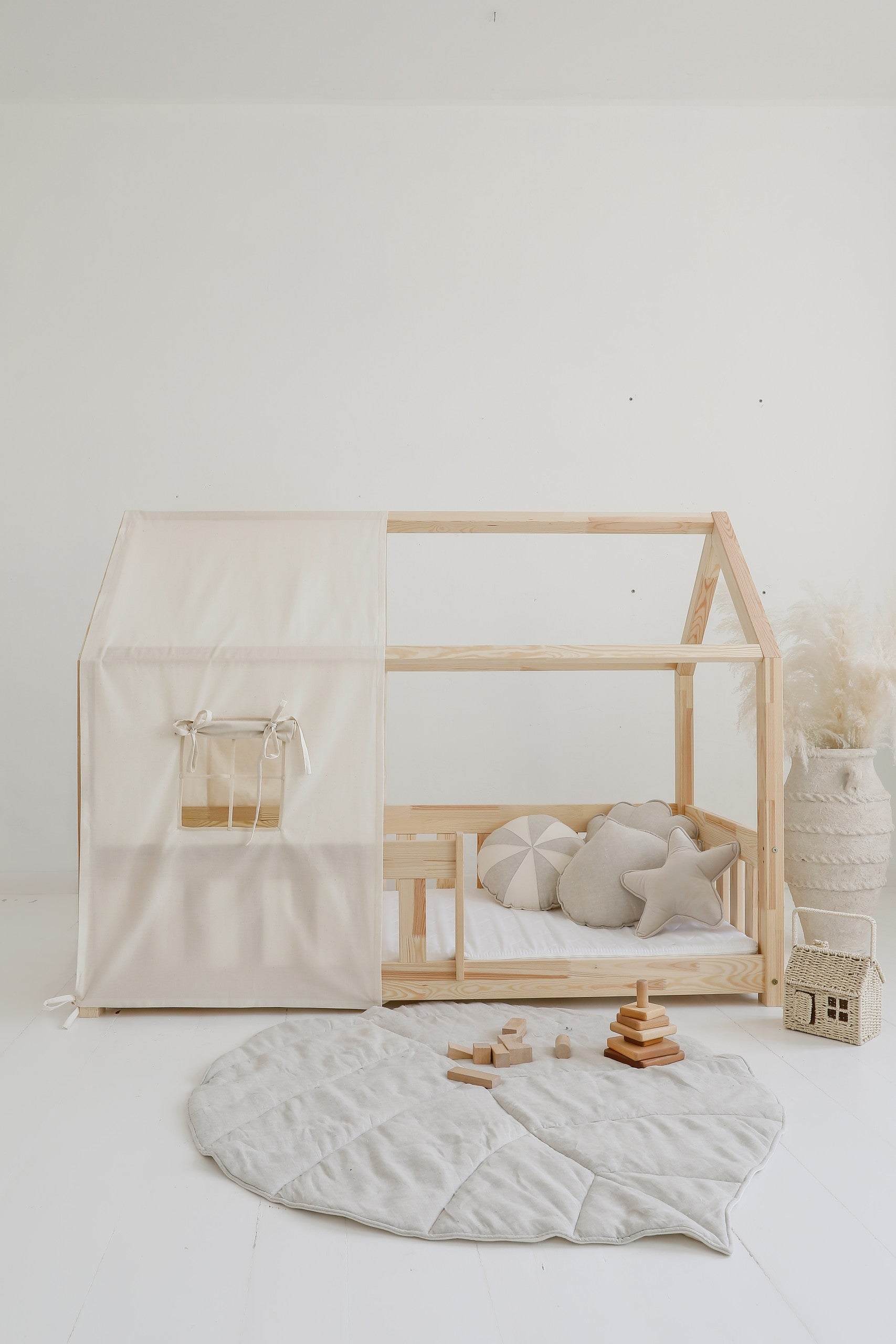 handmade sand ginkgo leaf playmat in a cozy nursery setting with soft morning light