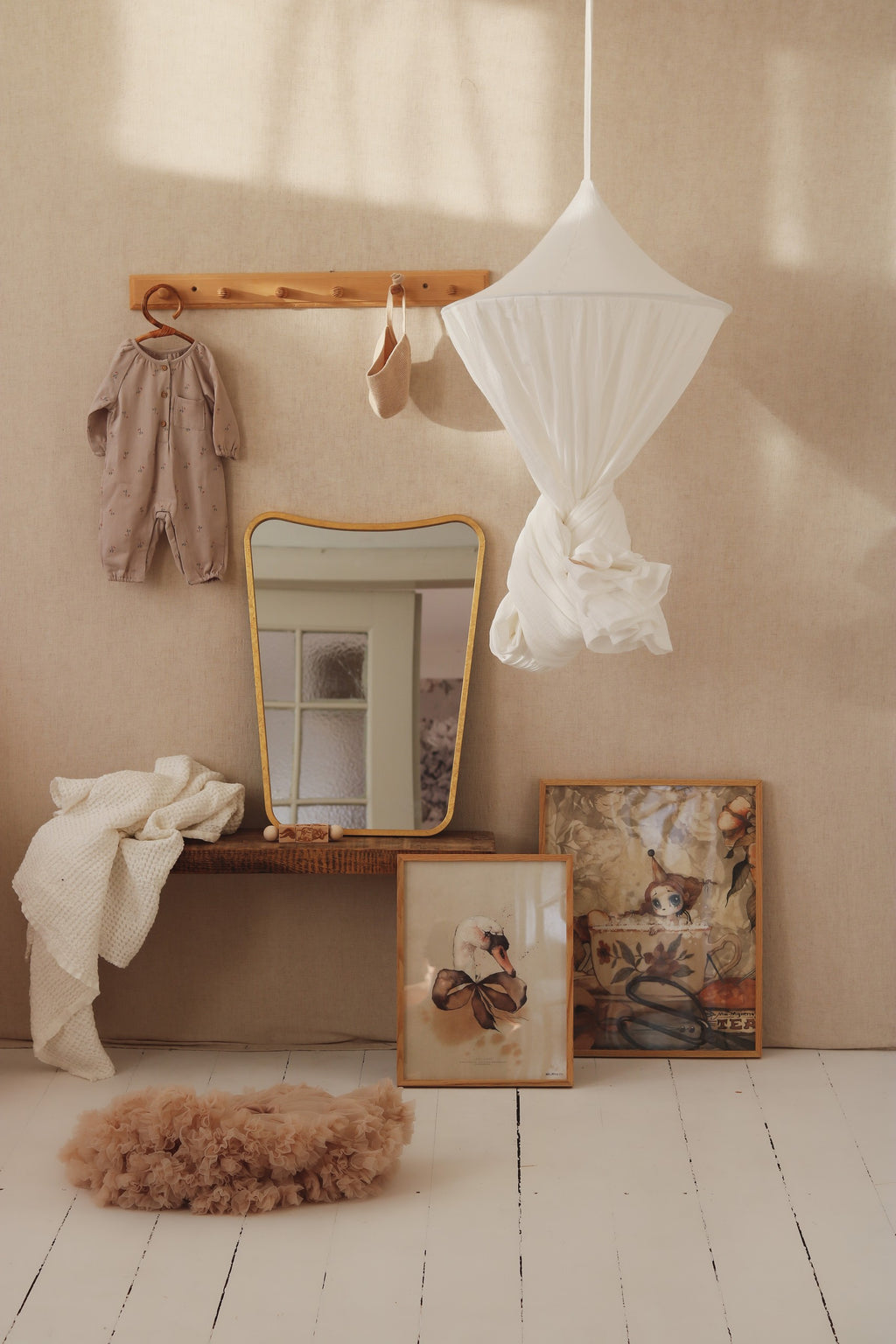 elegant cream cotton canopy draped gracefully over a bed, soft light filtering through the fabric