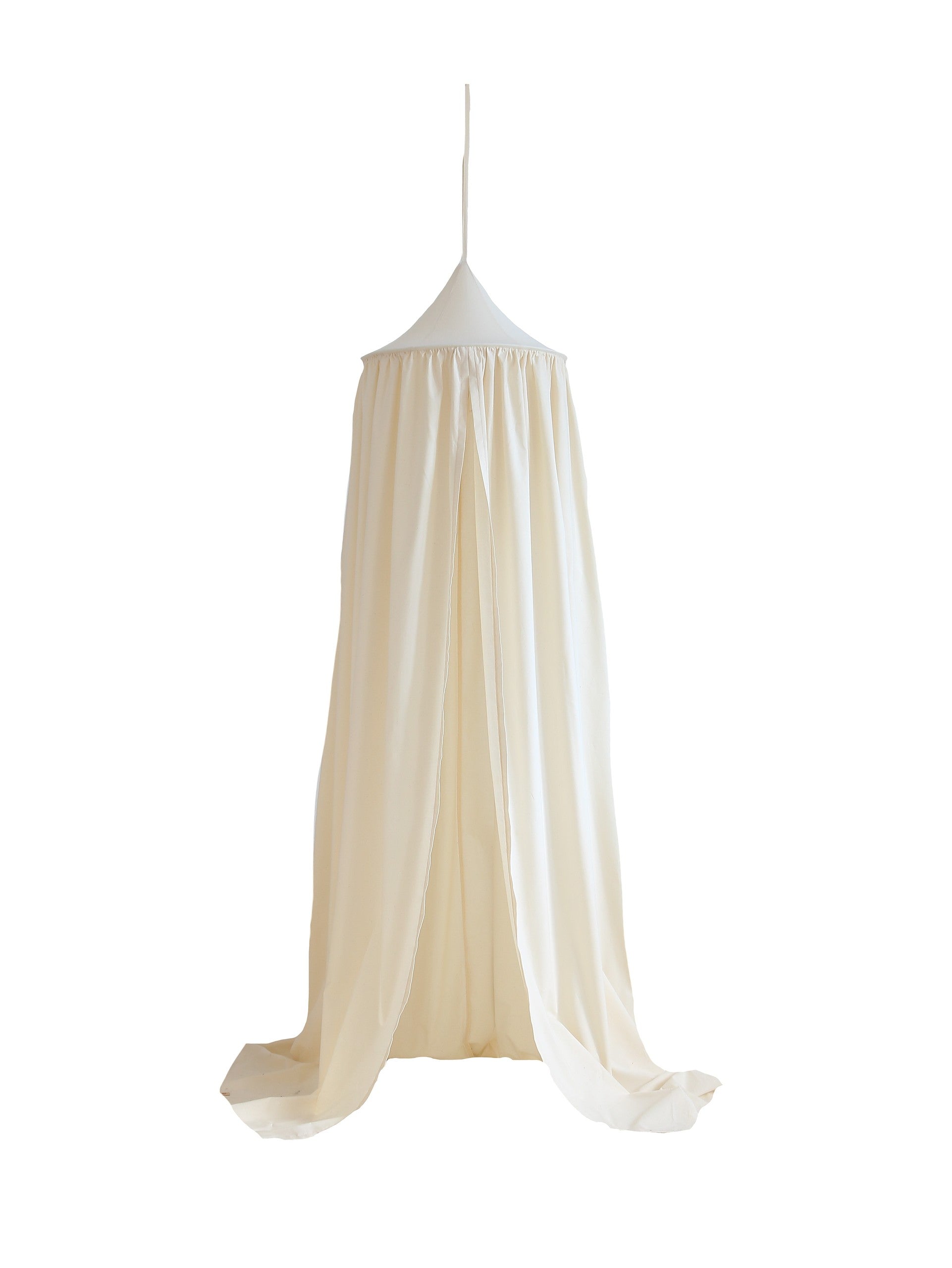 playful organic cotton canopy hanging over a cozy reading nook with soft sunlight filtering through the fabric