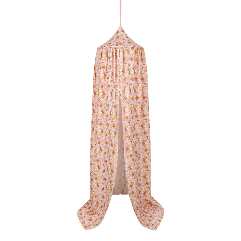 mint organic cotton canopy draped over a bed with soft morning light filtering through