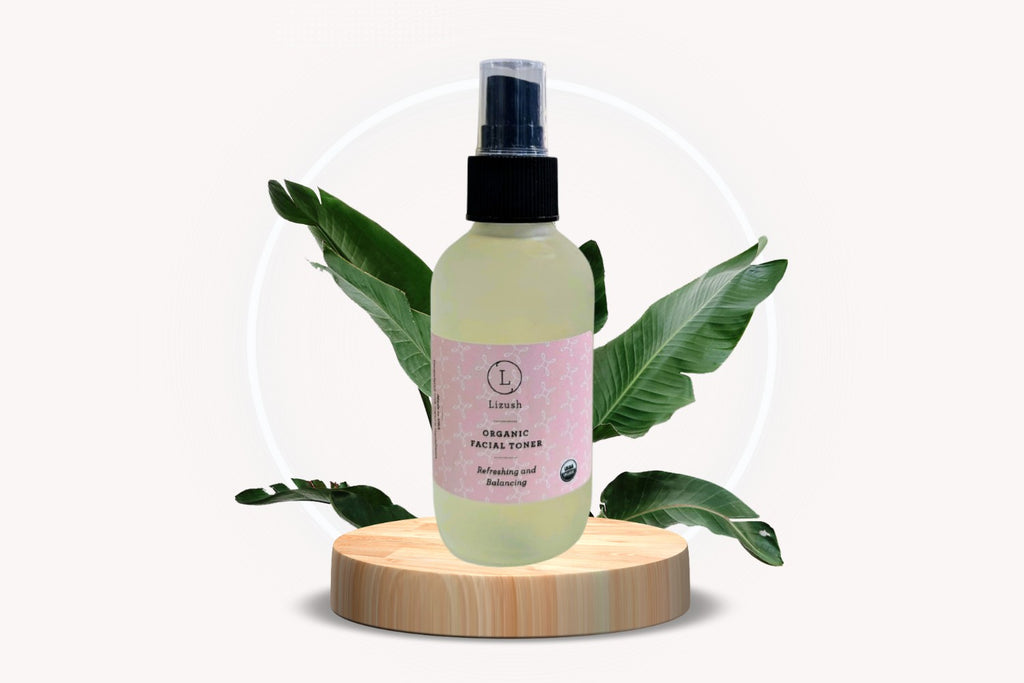 bold close-up of organic facial toner bottle with fresh neem and lavender on a dark slate background