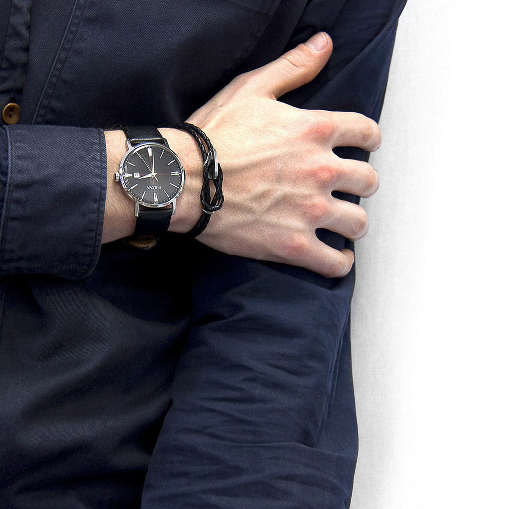 Embrace Timeless Elegance with the Coal Black Padstow Silver and Braided Leather Bracelet by ANCHOR & CREW at www.brixbailey.com