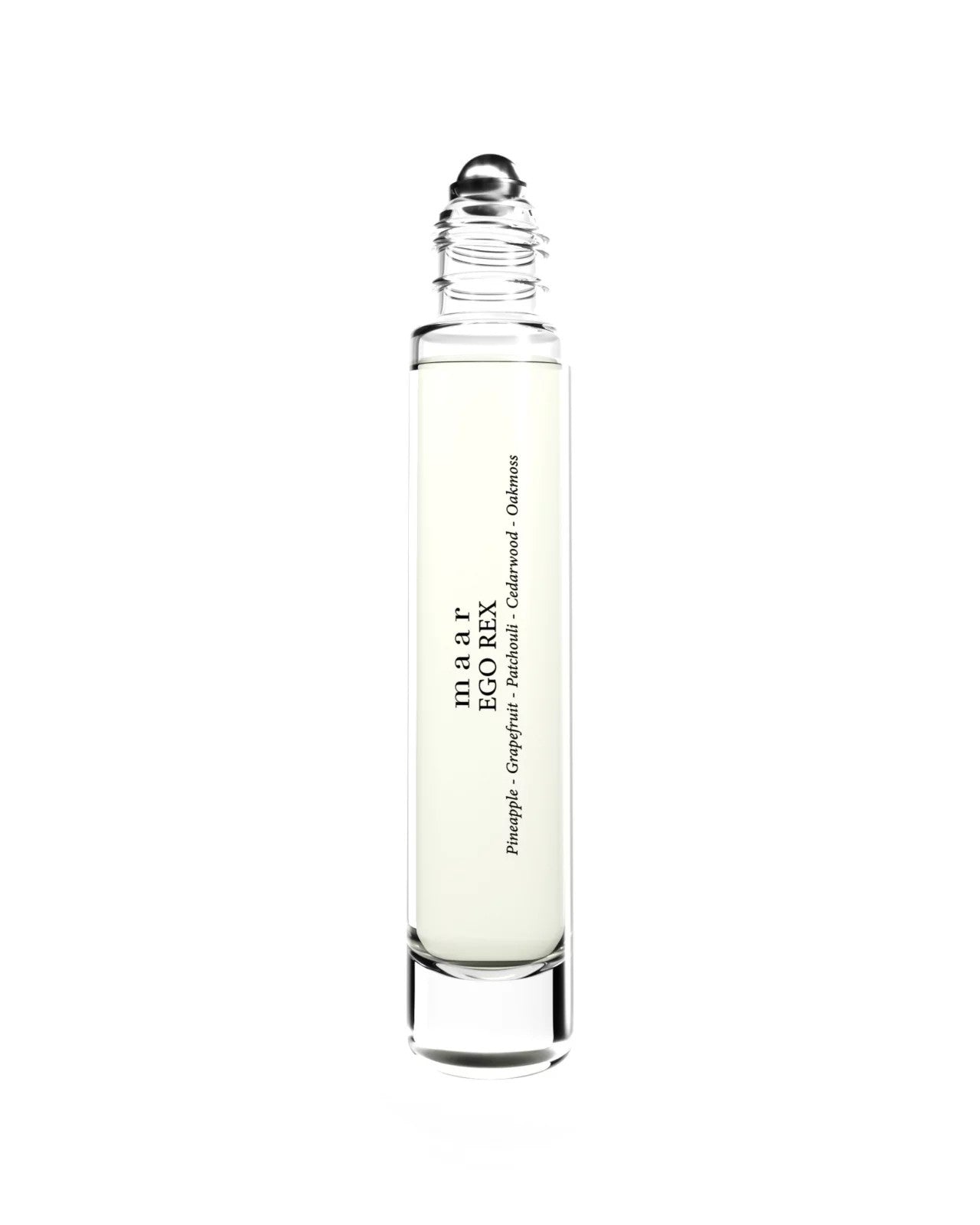 a soft-focus close-up of the ego rex perfume oil bottle resting on a cozy linen textile