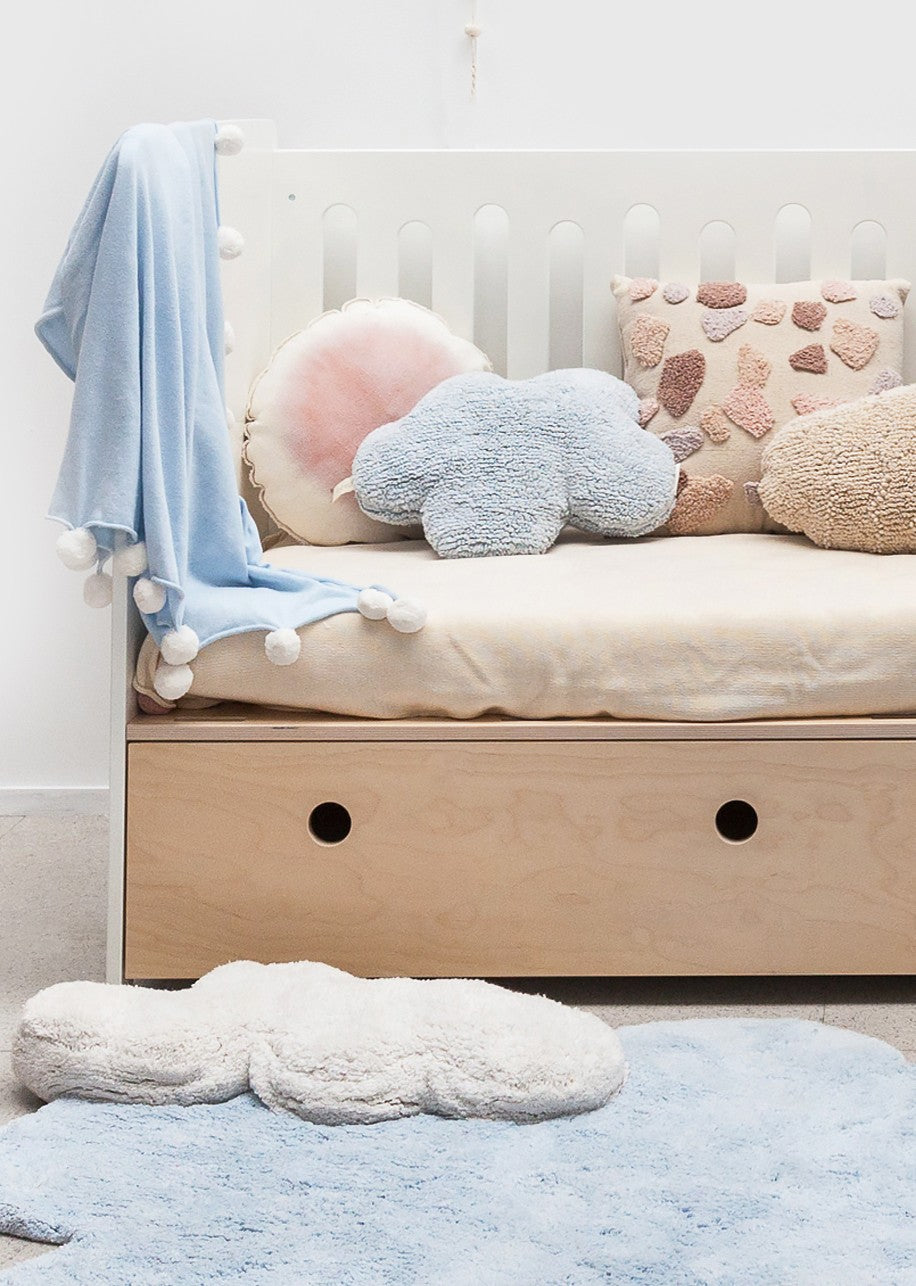 Transform Your Child’s Room with the Dreamy Cotton Cloud Throw Pillow by Lorena Canals at www.brixbailey.com
